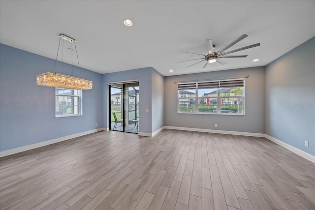 5191 78th St Cir E, Bradenton, FL 34203 - spare room with ceiling fan, wood finished floors, recessed lighting, and baseboards