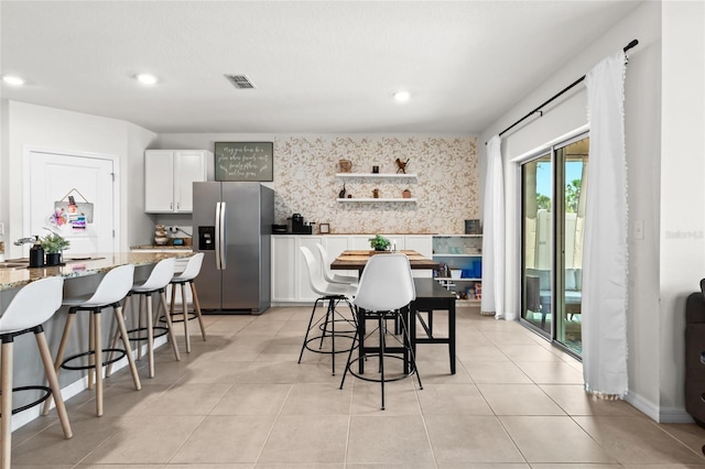 5659 Woodland Sage Dr, Sarasota, FL 34238 - dining room featuring recessed lighting and light tile patterned flooring