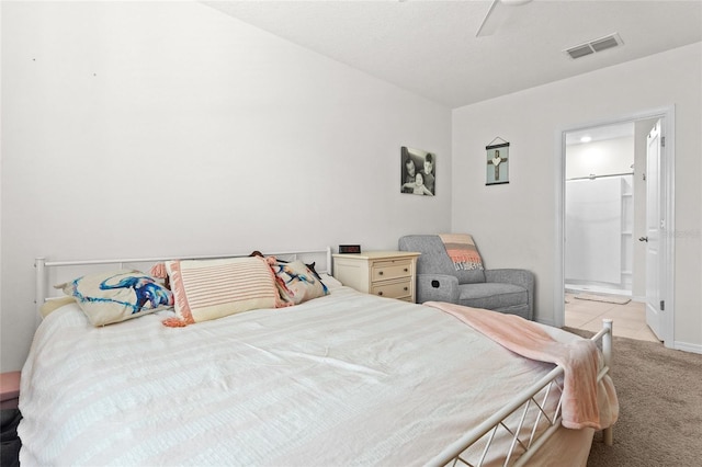 5659 Woodland Sage Dr, Sarasota, FL 34238 - bedroom featuring light carpet and a ceiling fan