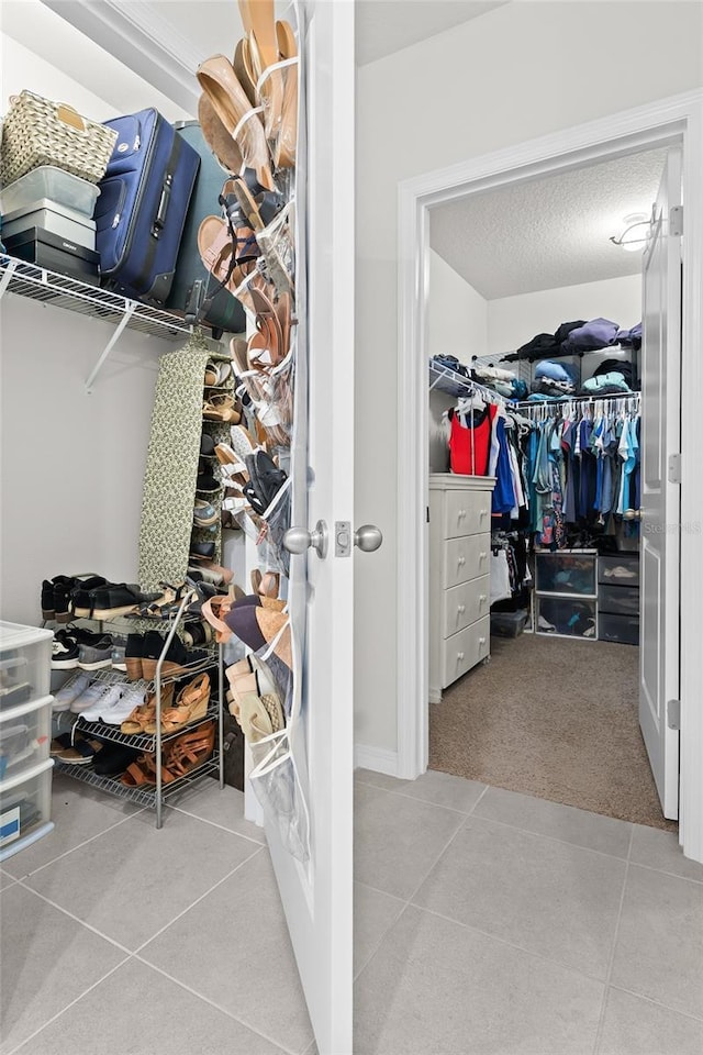 5659 Woodland Sage Dr, Sarasota, FL 34238 - spacious closet with tile patterned floors