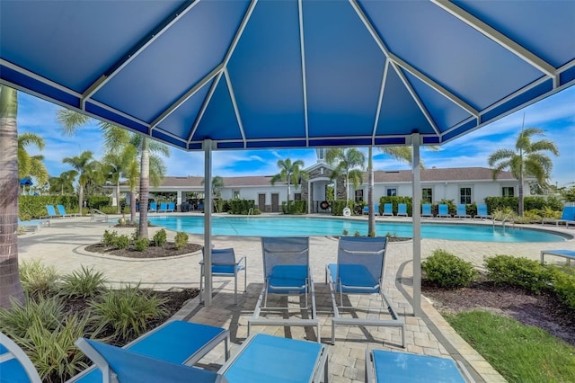 5659 Woodland Sage Dr, Sarasota, FL 34238 - community pool featuring a patio