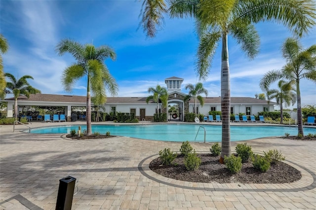 5659 Woodland Sage Dr, Sarasota, FL 34238 - community pool with a patio