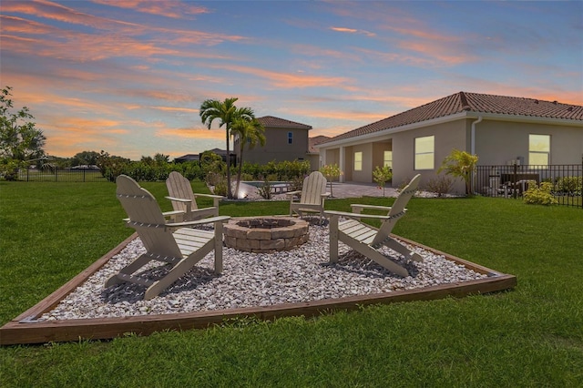 7508 Ripetta St, Sarasota, FL 34240 - view of yard featuring an outdoor fire pit and a patio