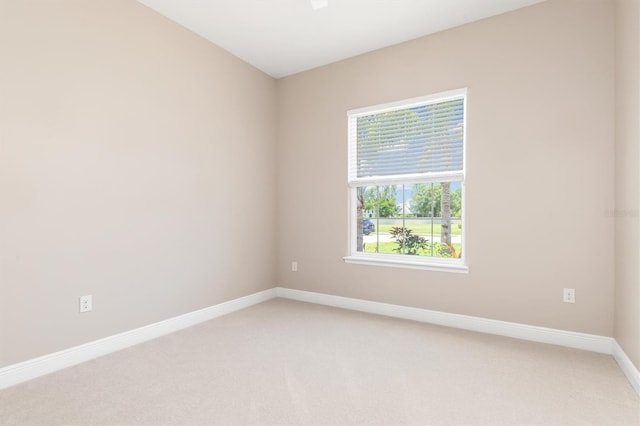 7508 Ripetta St, Sarasota, FL 34240 - unfurnished room featuring light carpet and baseboards