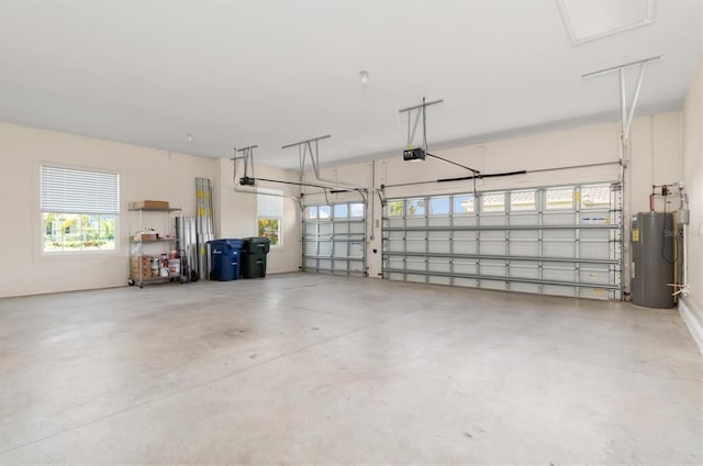 7508 Ripetta St, Sarasota, FL 34240 - garage featuring water heater and a garage door opener