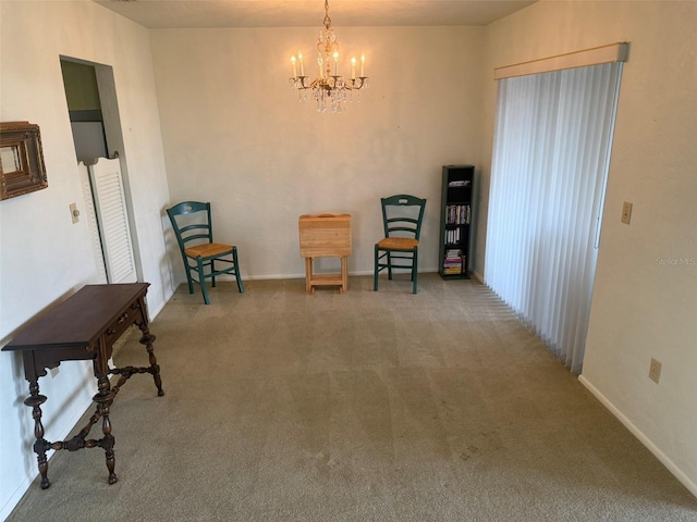 3673 Somerville Dr Unit 1510, Sarasota, FL 34232 - living area featuring carpet, a chandelier, and baseboards