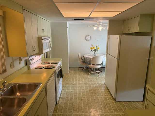 3673 Somerville Dr Unit 1510, Sarasota, FL 34232 - kitchen with white appliances, a sink, and ceiling fan