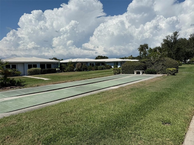 3673 Somerville Dr Unit 1510, Sarasota, FL 34232 - surrounding community featuring shuffleboard and a lawn