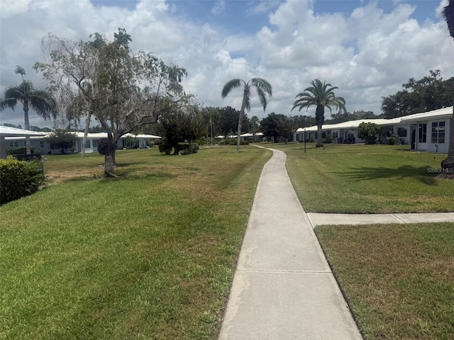 3673 Somerville Dr Unit 1510, Sarasota, FL 34232 - view of grassy yard