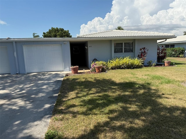 3673 Somerville Dr Unit 1510, Sarasota, FL 34232 - ranch-style home featuring an attached garage, a front yard, stucco siding, and concrete driveway