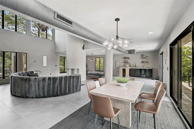 512 Treasure Boat Way, Sarasota, FL 34242 - dining area featuring a chandelier, recessed lighting, and light tile patterned floors
