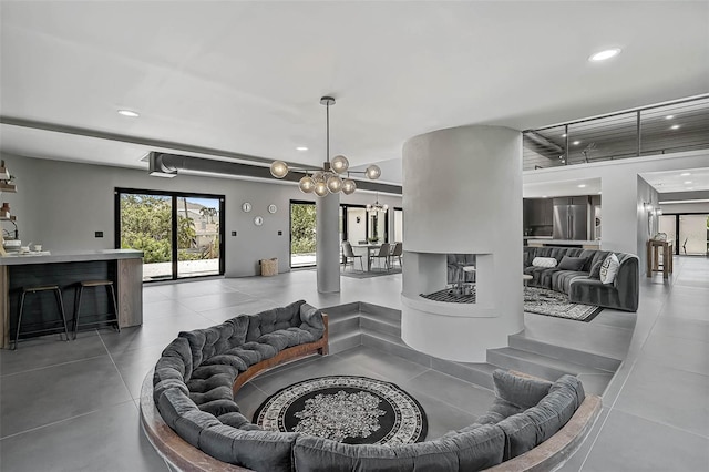 512 Treasure Boat Way, Sarasota, FL 34242 - tiled living area with recessed lighting and a chandelier
