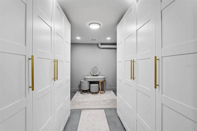 512 Treasure Boat Way, Sarasota, FL 34242 - hall with recessed lighting and dark tile patterned flooring