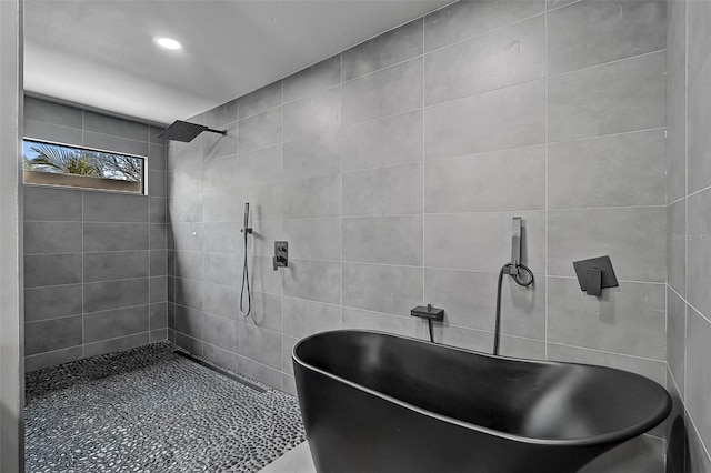 512 Treasure Boat Way, Sarasota, FL 34242 - full bathroom with a soaking tub, a tile shower, and recessed lighting