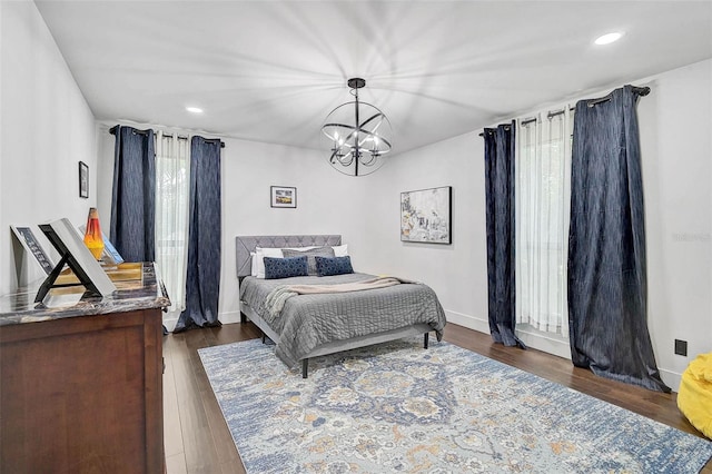 512 Treasure Boat Way, Sarasota, FL 34242 - bedroom featuring a chandelier, wood finished floors, and recessed lighting