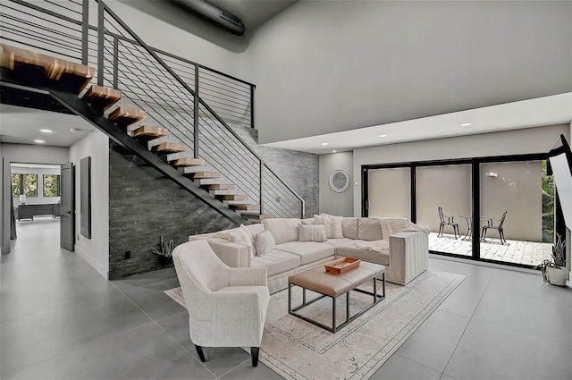 512 Treasure Boat Way, Sarasota, FL 34242 - living area with stairway, recessed lighting, and a towering ceiling