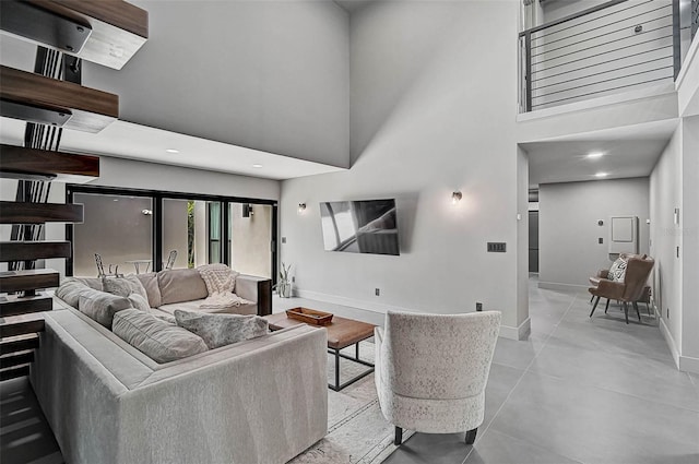 512 Treasure Boat Way, Sarasota, FL 34242 - living area with baseboards and a towering ceiling
