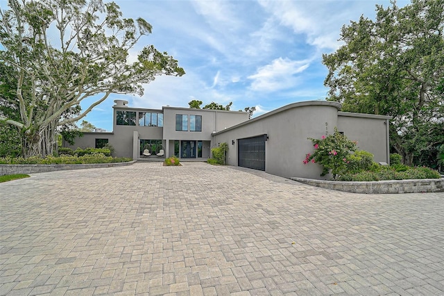 512 Treasure Boat Way, Sarasota, FL 34242 - view of front of property with a garage, decorative driveway, and stucco siding