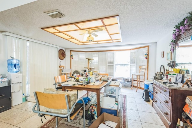 418 W Holly Dr, Orange City, FL 32763 - dining area with ceiling fan, healthy amount of natural light, a textured ceiling, and light tile patterned flooring
