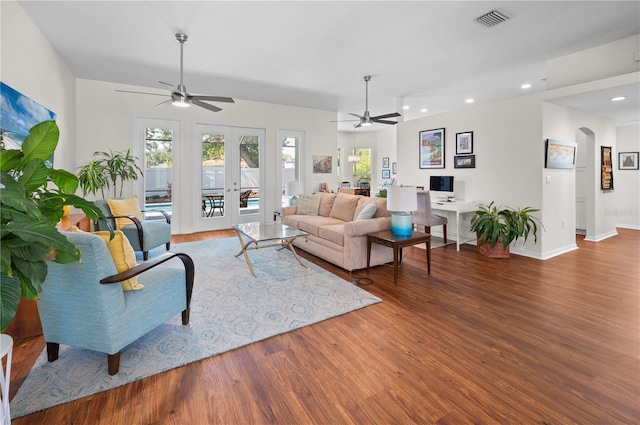 5110 19th Ave W, Bradenton, FL 34209 - living area with ceiling fan, french doors, wood finished floors, recessed lighting, and arched walkways
