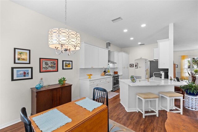 5110 19th Ave W, Bradenton, FL 34209 - dining space featuring dark wood-style flooring, a chandelier, recessed lighting, and baseboards