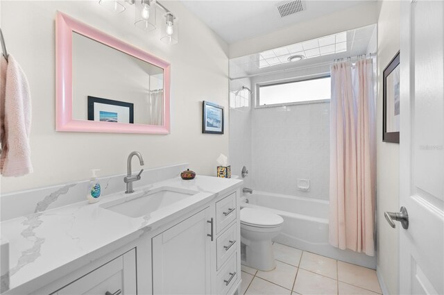 5110 19th Ave W, Bradenton, FL 34209 - full bathroom featuring vanity, toilet, tile patterned floors, and shower / tub combo