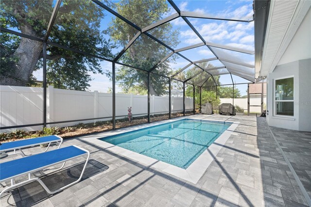 5110 19th Ave W, Bradenton, FL 34209 - view of pool with a patio area, a fenced backyard, and glass enclosure