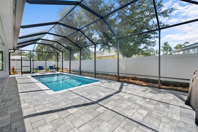5110 19th Ave W, Bradenton, FL 34209 - view of swimming pool featuring a patio, a fenced backyard, and a lanai