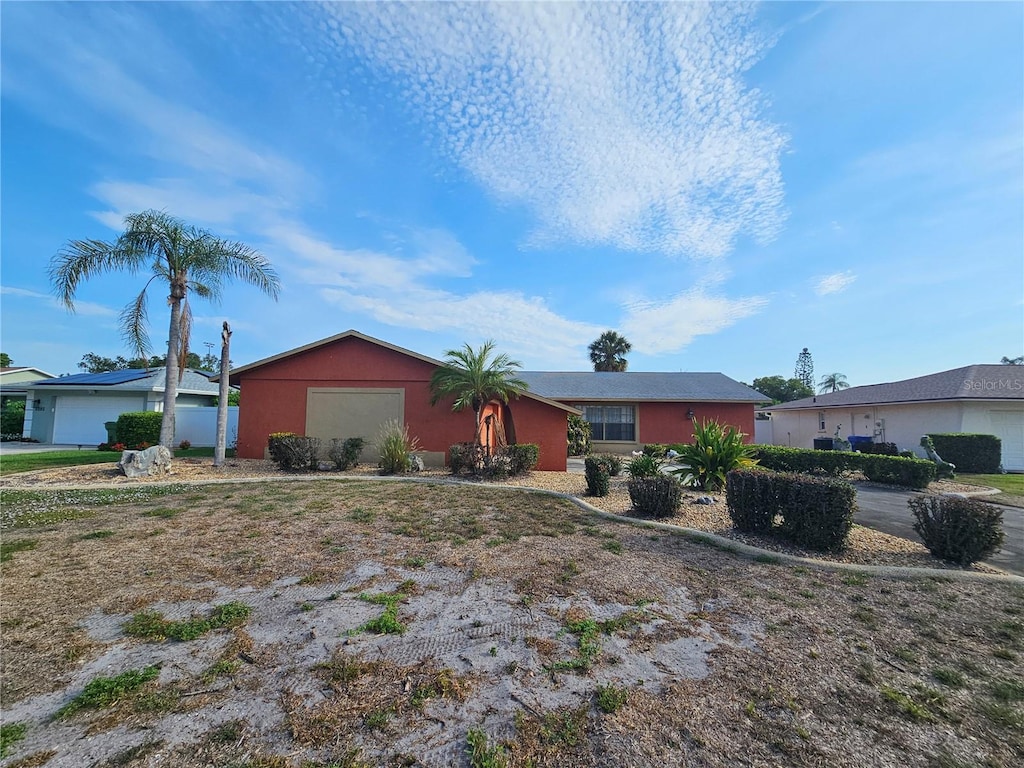 5114 36th Avenue Dr W, Bradenton, FL 34209 - ranch-style home with a garage and stucco siding
