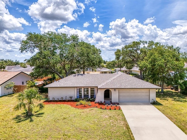 4155 Center Gate Blvd, Sarasota, FL 34233 - ranch-style house with a garage, driveway, stucco siding, and roof with shingles