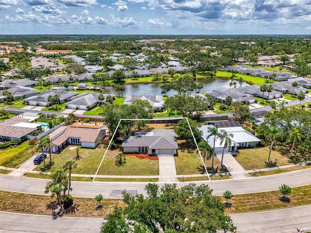 4155 Center Gate Blvd, Sarasota, FL 34233 - aerial perspective of suburban area with property parcel outlined and a large body of water