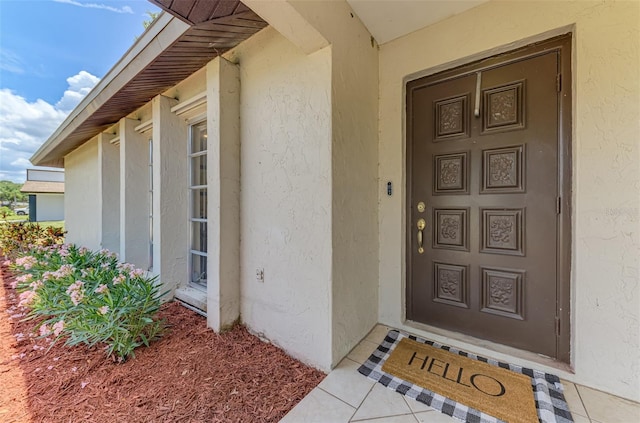 4155 Center Gate Blvd, Sarasota, FL 34233 - view of exterior entry featuring stucco siding