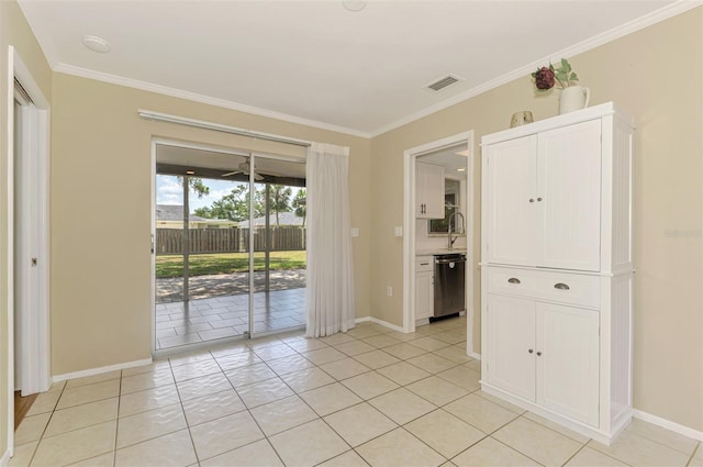4155 Center Gate Blvd, Sarasota, FL 34233 - unfurnished room featuring ornamental molding, baseboards, light tile patterned floors, and a sink