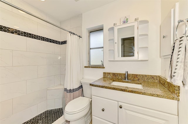 4155 Center Gate Blvd, Sarasota, FL 34233 - bathroom featuring toilet, vanity, and a tile shower