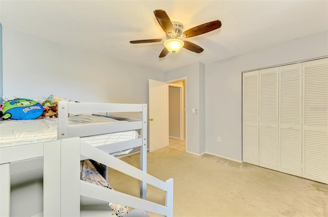 4155 Center Gate Blvd, Sarasota, FL 34233 - bedroom featuring carpet, a ceiling fan, baseboards, and a closet