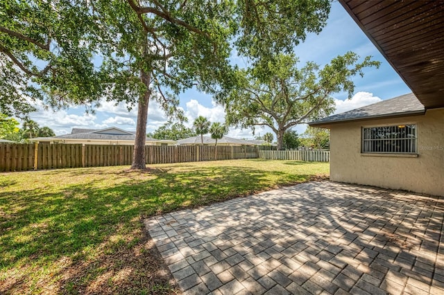 4155 Center Gate Blvd, Sarasota, FL 34233 - view of yard featuring a patio