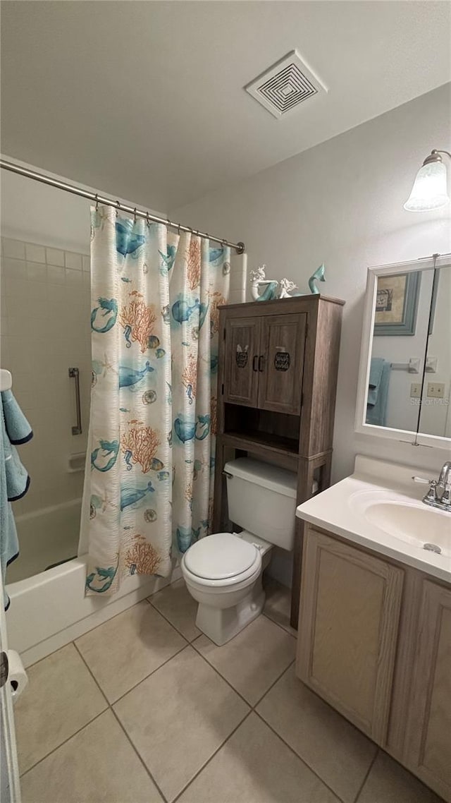 1111 Harefield Cir, Sun City Center, FL 33573 - full bathroom with shower / bath combination with curtain, toilet, vanity, and tile patterned floors
