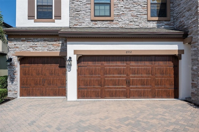 8932 Isabella Cir, Parrish, FL 34219 - garage with decorative driveway