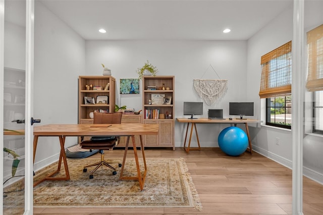 8932 Isabella Cir, Parrish, FL 34219 - office space with wood finished floors, baseboards, and recessed lighting
