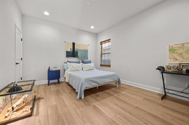 8932 Isabella Cir, Parrish, FL 34219 - bedroom featuring light wood-style floors, baseboards, and recessed lighting