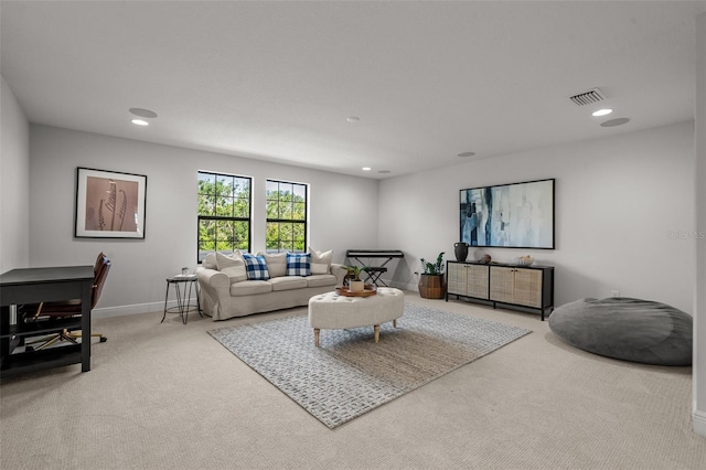 8932 Isabella Cir, Parrish, FL 34219 - living area featuring carpet flooring, recessed lighting, and baseboards