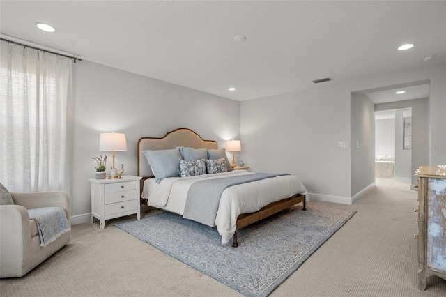 8932 Isabella Cir, Parrish, FL 34219 - bedroom featuring light carpet, recessed lighting, and baseboards