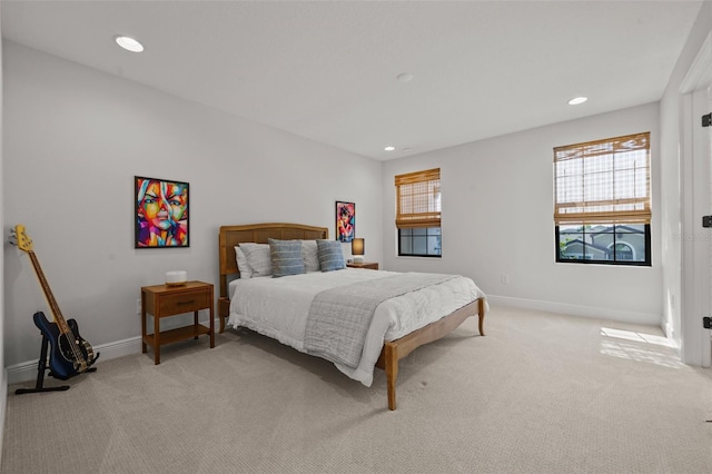8932 Isabella Cir, Parrish, FL 34219 - bedroom featuring light colored carpet, baseboards, and recessed lighting