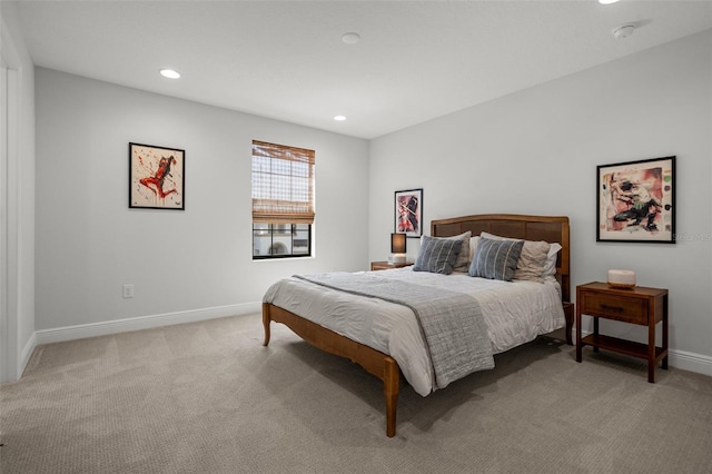 8932 Isabella Cir, Parrish, FL 34219 - bedroom featuring light carpet, baseboards, and recessed lighting
