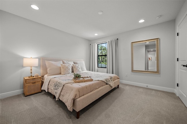 8932 Isabella Cir, Parrish, FL 34219 - bedroom with light carpet, recessed lighting, and baseboards
