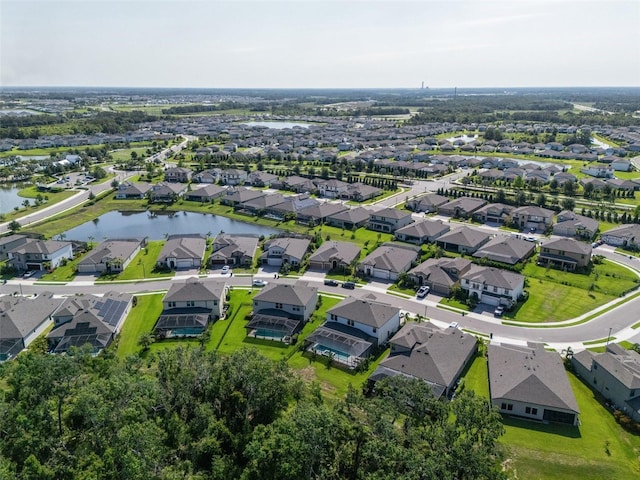 8932 Isabella Cir, Parrish, FL 34219 - aerial view of property and surrounding area featuring a large body of water and nearby suburban area