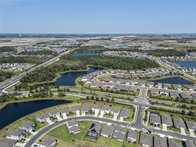 8932 Isabella Cir, Parrish, FL 34219 - aerial overview of property's location with nearby suburban area and a large body of water