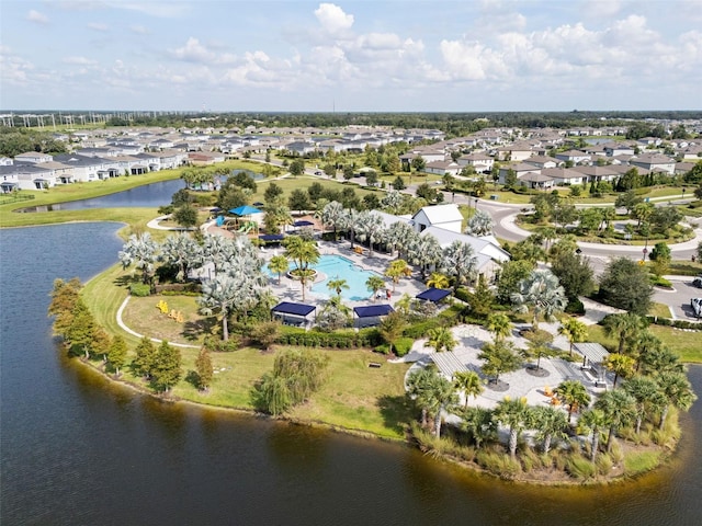 8932 Isabella Cir, Parrish, FL 34219 - aerial overview of property's location with a pool, nearby suburban area, and a nearby body of water