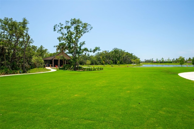 8932 Isabella Cir, Parrish, FL 34219 - view of community featuring a water view and a lawn