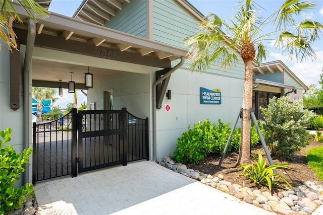 8932 Isabella Cir, Parrish, FL 34219 - view of exterior entry with a gate